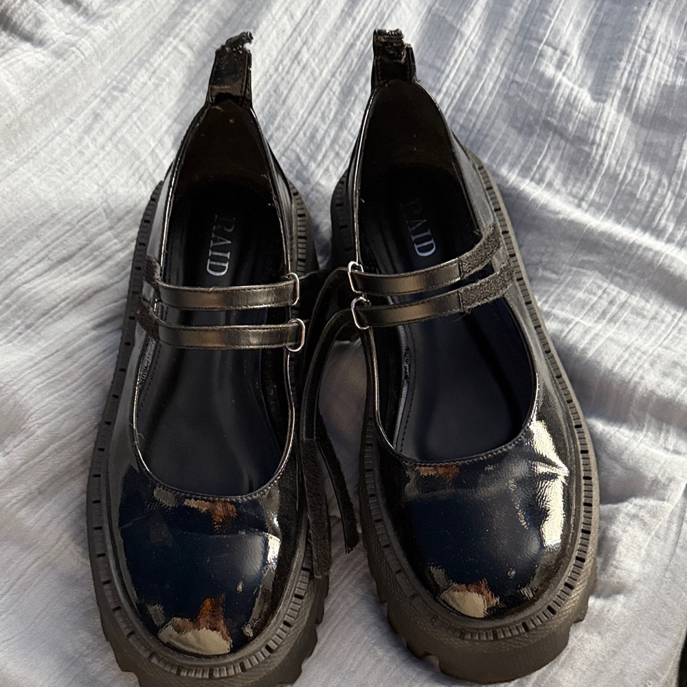 Black Patent Leather RAID Mary Jane’s